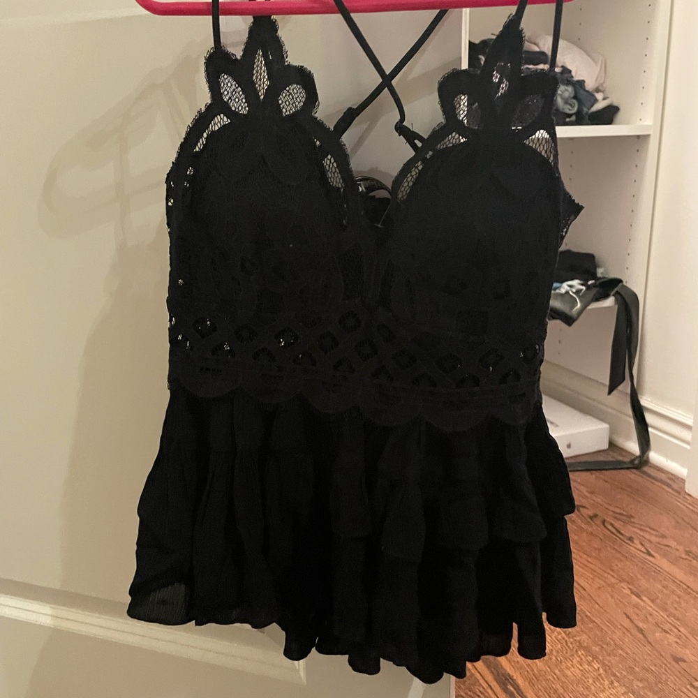 The cutest lace and ruffle tank top!